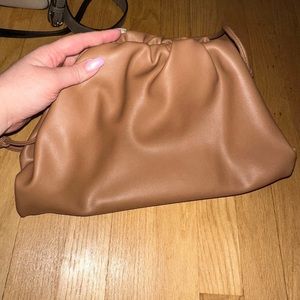 Tan faux leather dumpling clutch